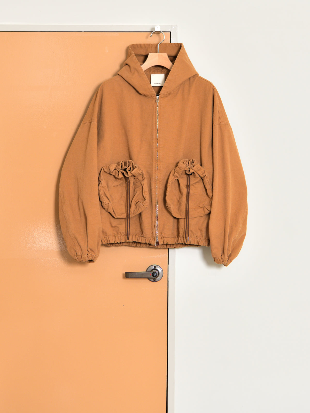 refomed "KINCHAKU DUCK HOODIE (RENGA)"