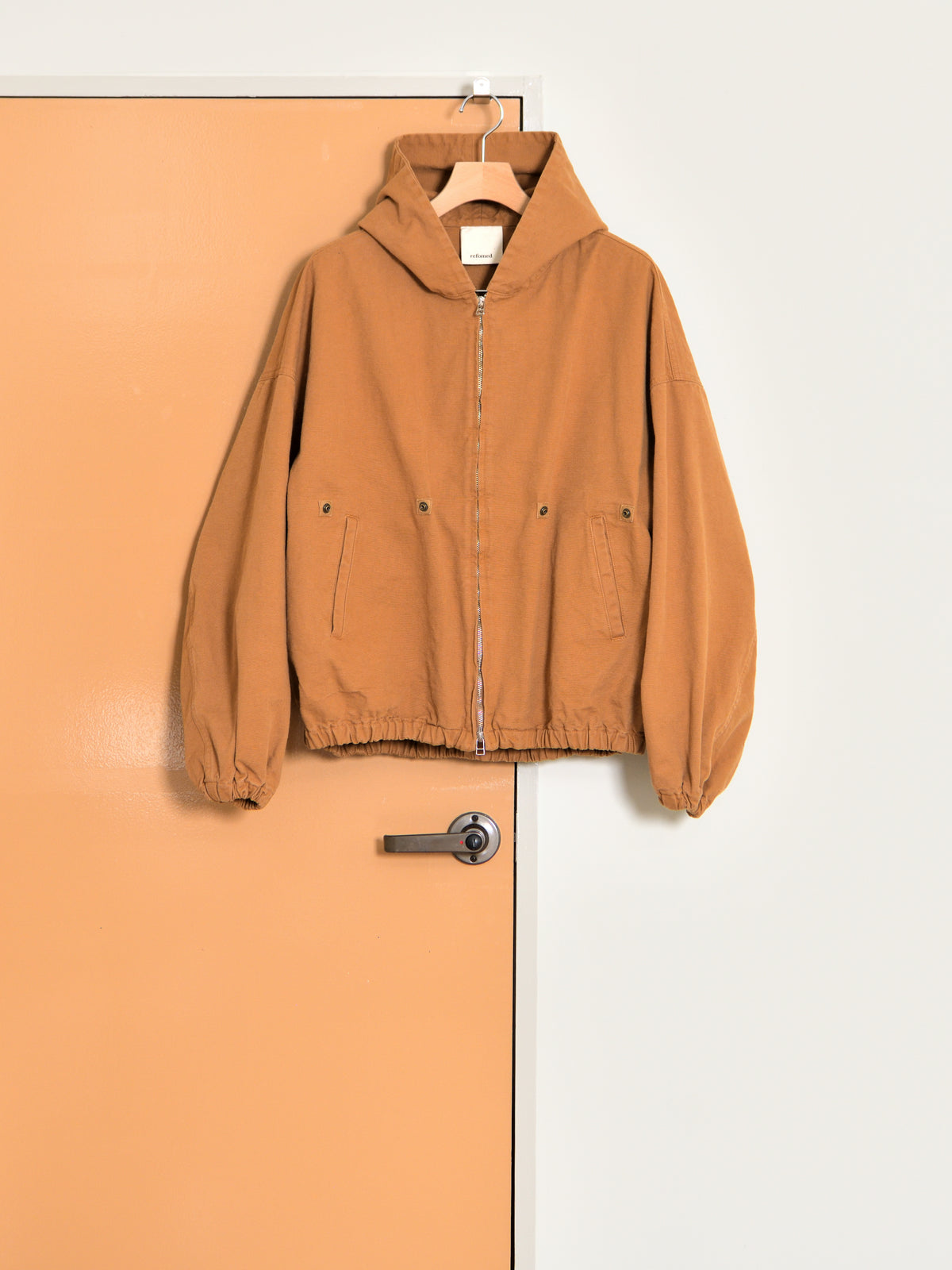 refomed "KINCHAKU DUCK HOODIE (RENGA)"
